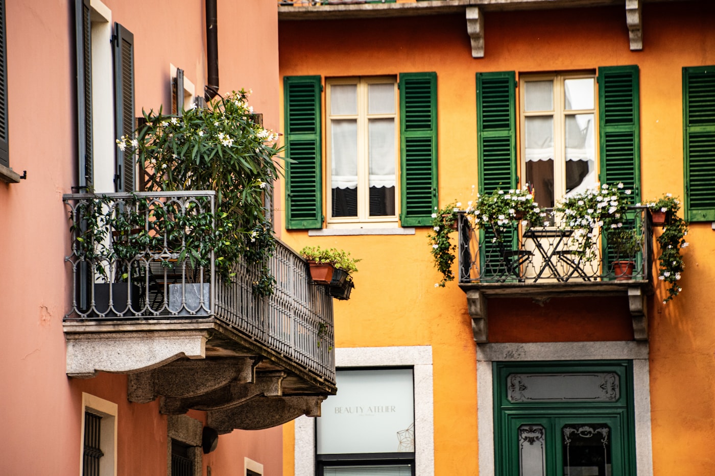 Italian residential building with green shutters
